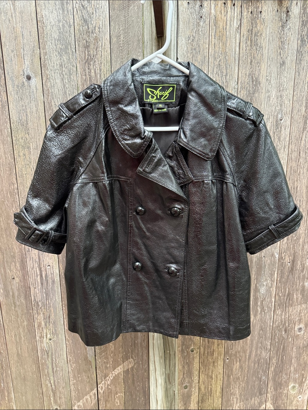 Sharif Short sleeve textured black Leather double breasted cropped jacket